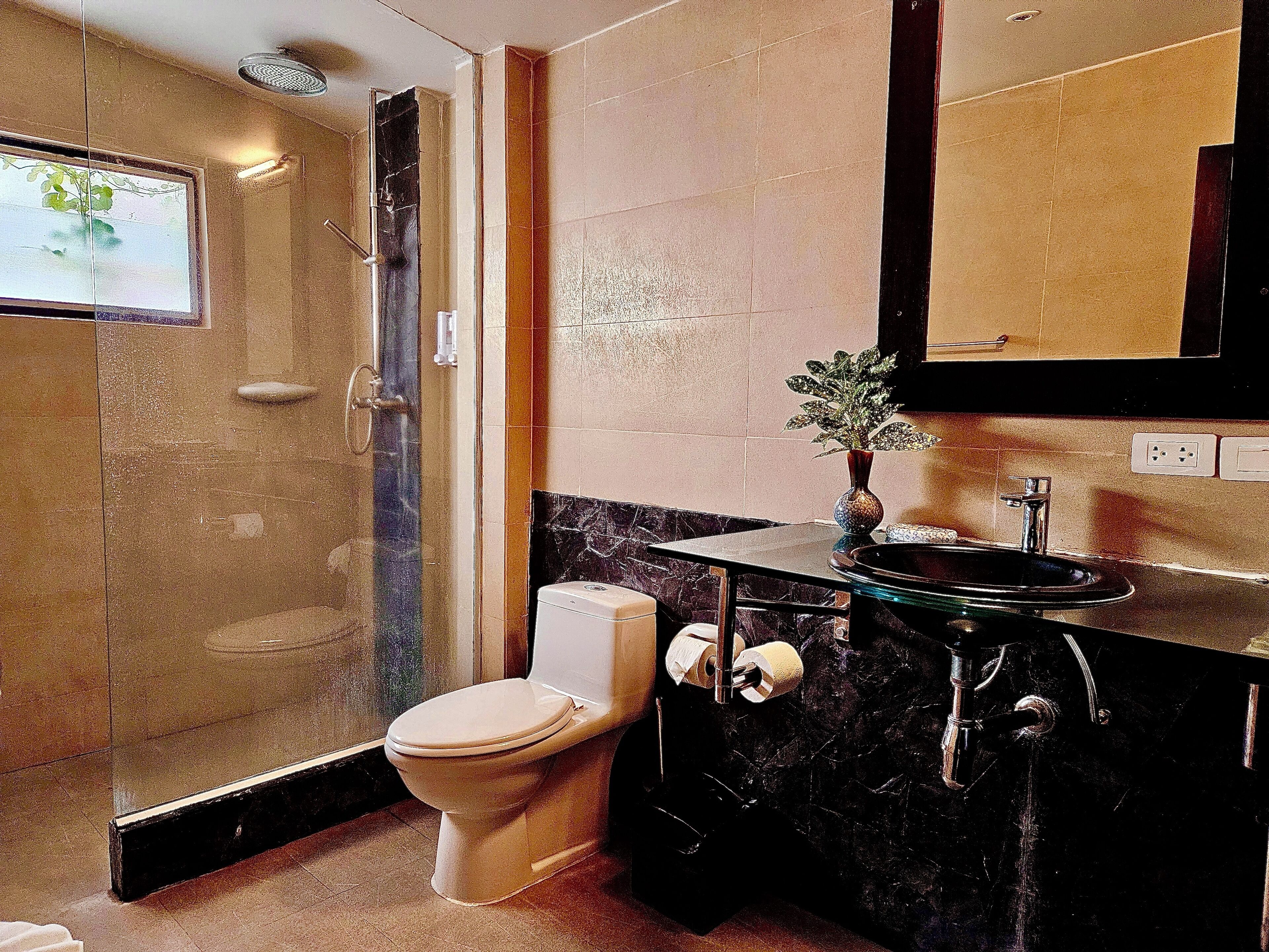 family villa | bathroom | hair dryer, towels, soap, shampoo