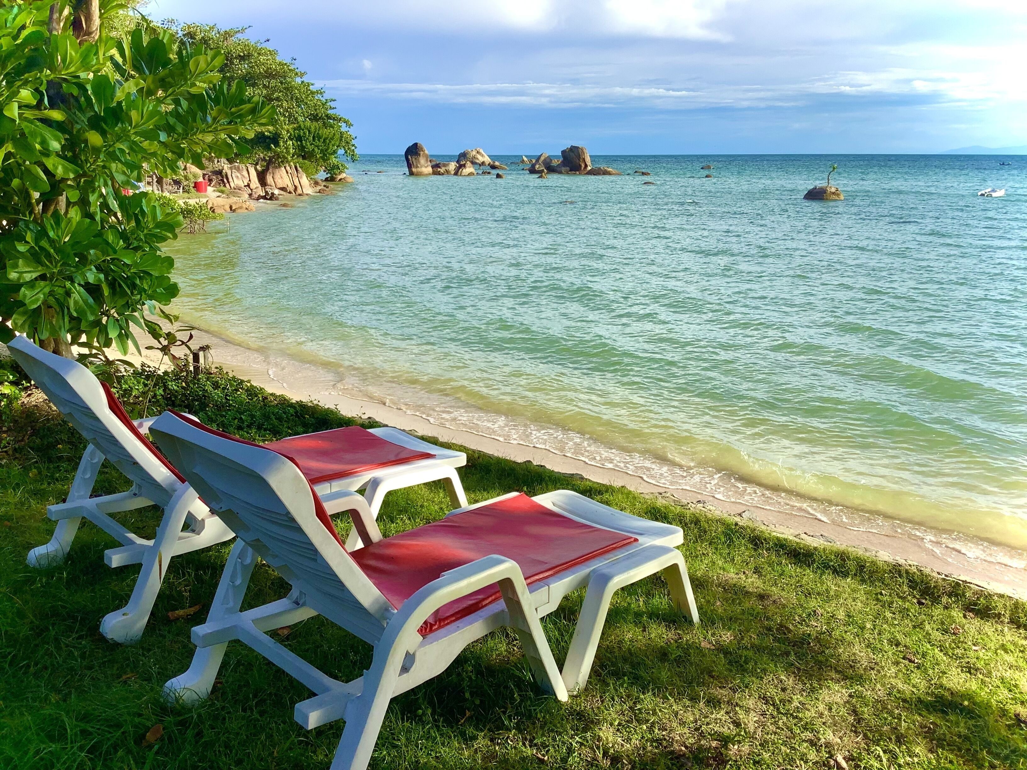 on the beach, white sand, sun-loungers, beach umbrellas