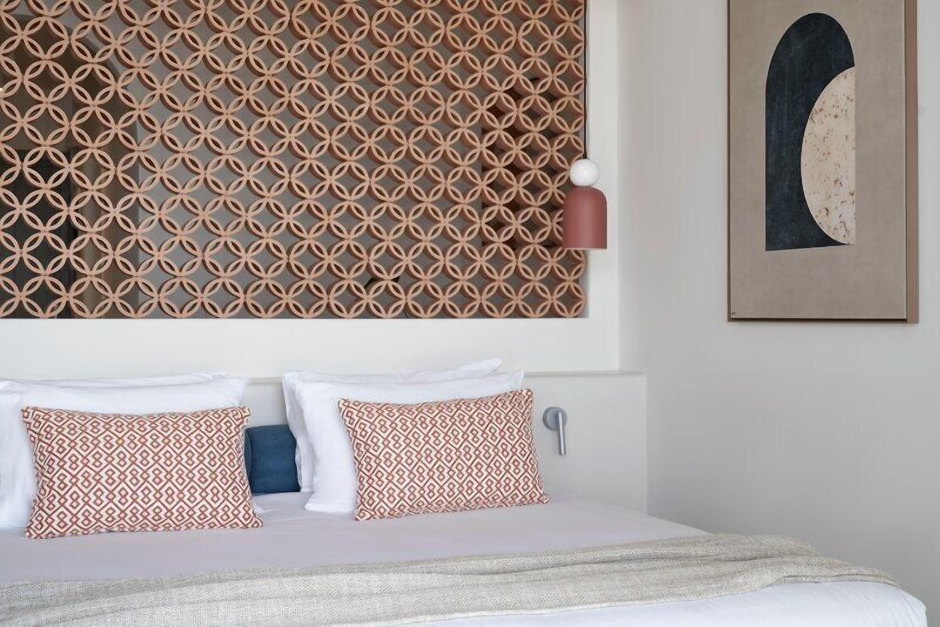 Terra Suite Sea View | Hypo-allergenic bedding available, minibar, in-room safe