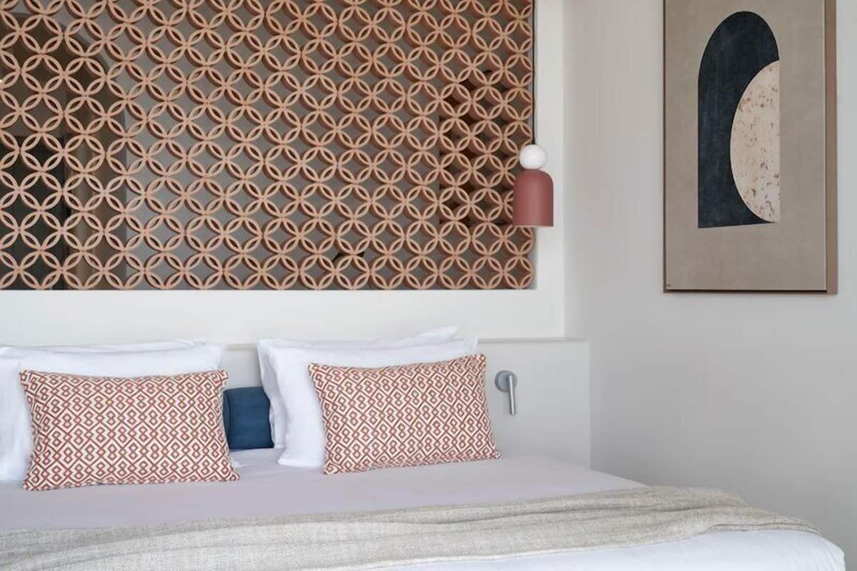 Terra Suite Sea View | Hypo-allergenic bedding available, minibar, in-room safe