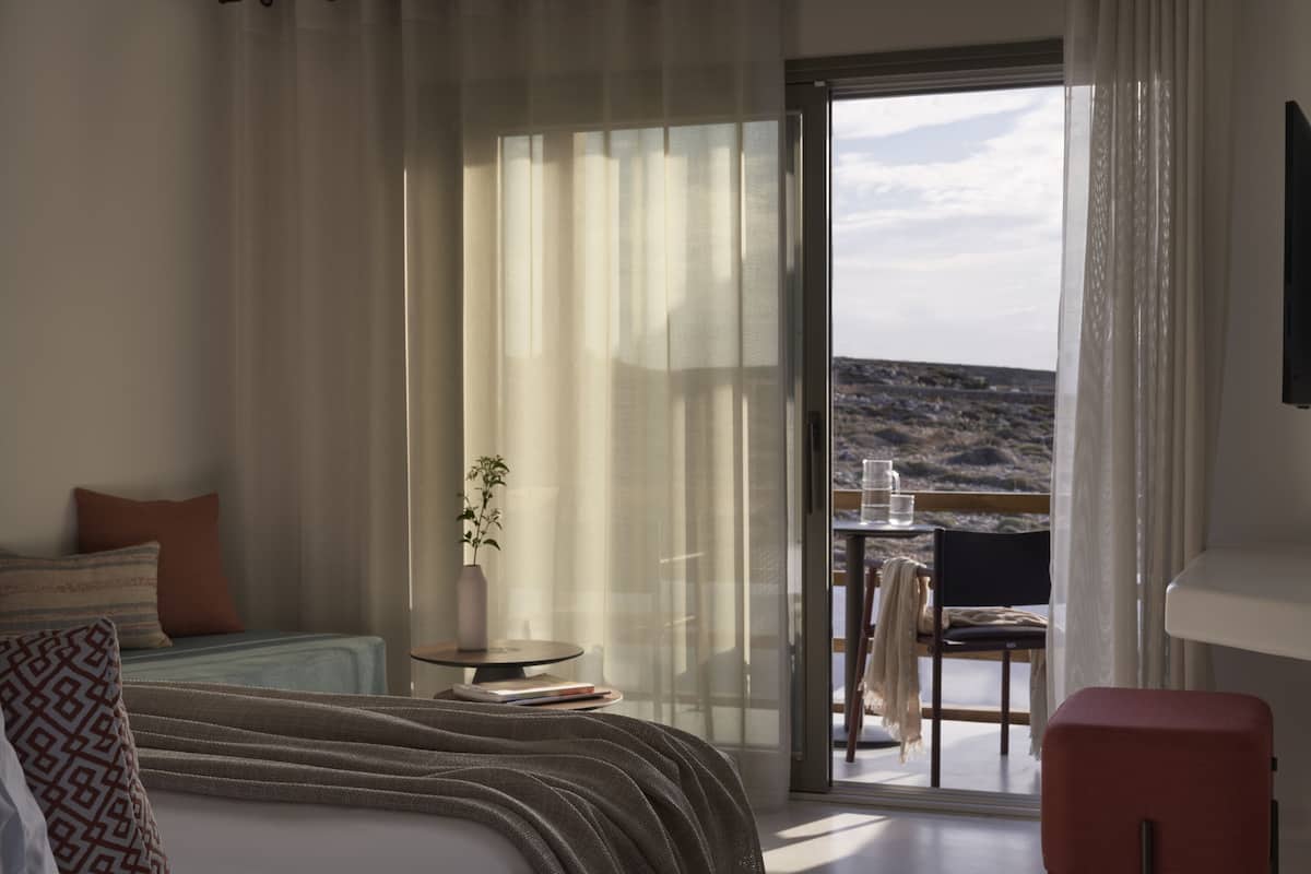 Hypo-allergenic bedding, minibar, in-room safe