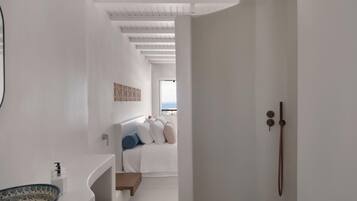Hypo-allergenic bedding, minibar, in-room safe