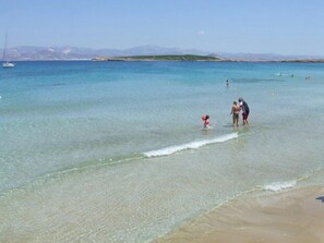 On the beach, beach cabanas, sun-loungers, beach umbrellas