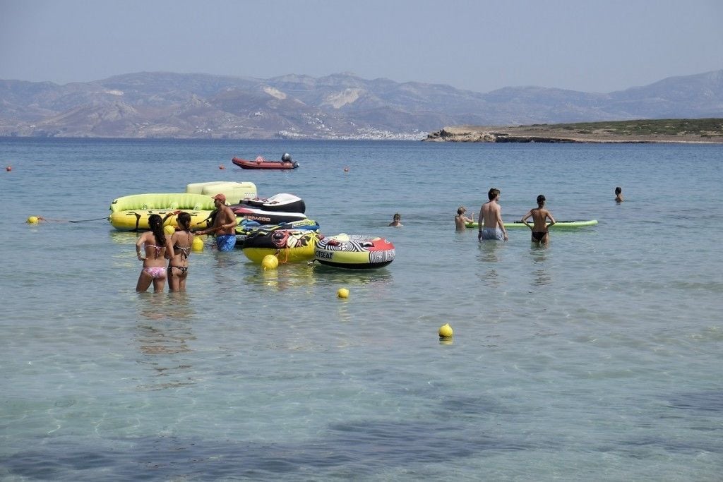 on the beach, sun-loungers, beach umbrellas, beach bar