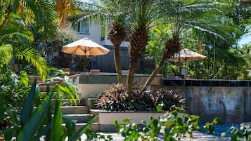 2 indoor pools, outdoor pool, open 7:00 AM to 7:00 PM, pool umbrellas