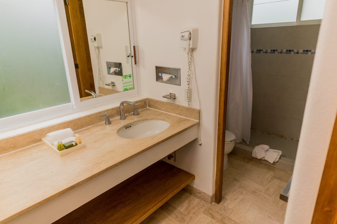 senior suite | bathroom | shower, free toiletries, hair dryer, bathrobes