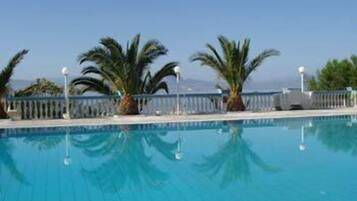 Seasonal outdoor pool, sun loungers