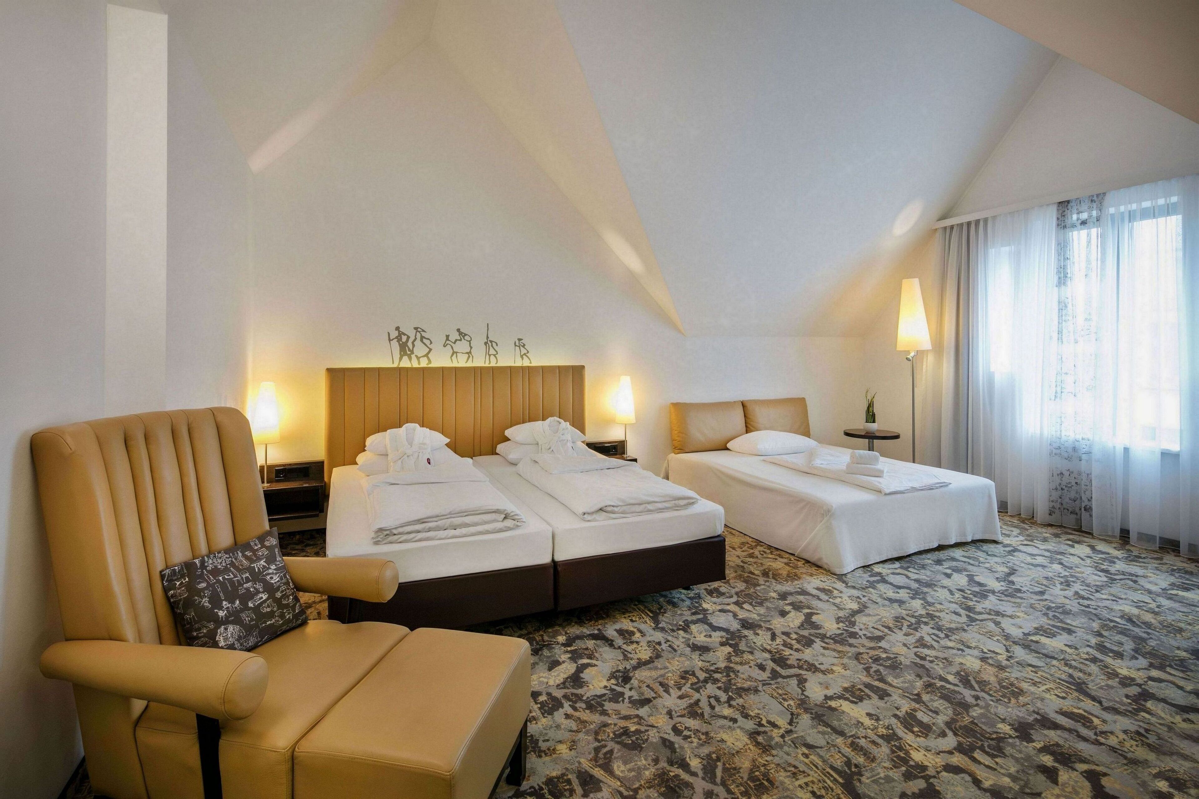 hypo-allergenic bedding, minibar, in-room safe, desk