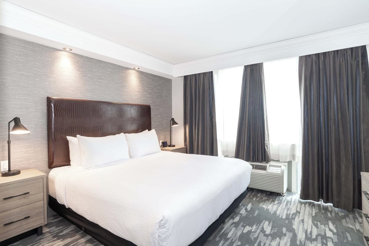 Standard Suite, 1 King Bed, Kitchenette | 1 bedroom, premium bedding, in-room safe, desk