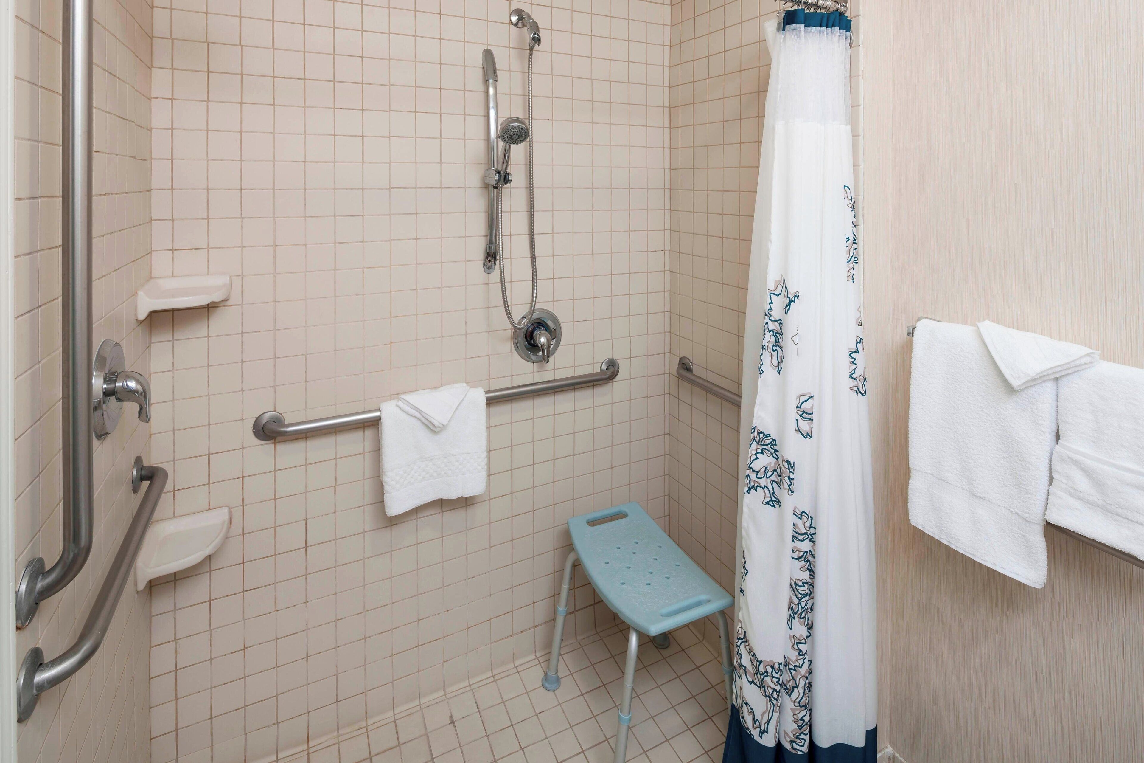 combined shower/bathtub, free toiletries, hair dryer, towels