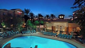 Outdoor pool, open 10:00 AM to 8:00 PM, pool umbrellas