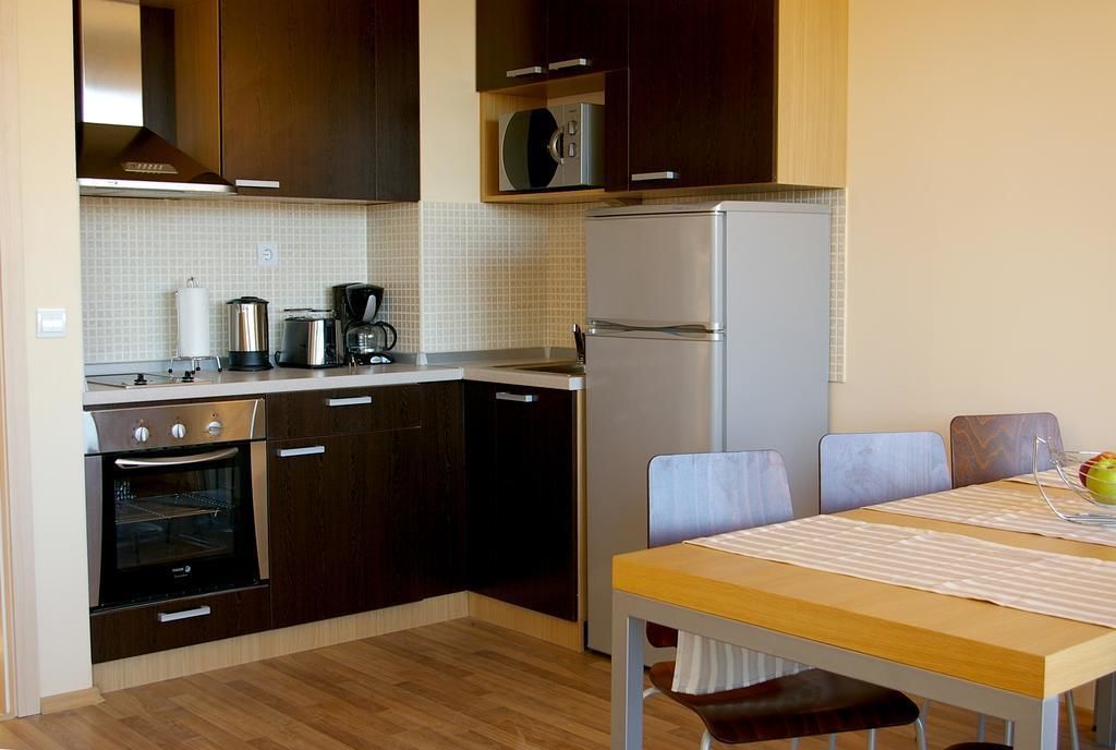 apartment, 3 bedrooms, sea view | minibar, desk, laptop workspace, cots/infant beds