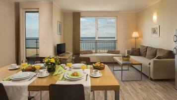 32-inch flat-screen TV with cable channels, TV