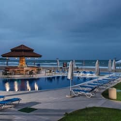Seasonal outdoor pool, pool umbrellas, pool loungers