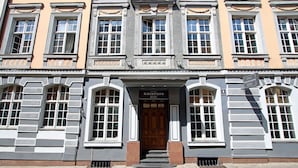 A historic building with a central entrance, large windows, and decorative moldings. - Boutique Hotel KRISTOFS (Riga)