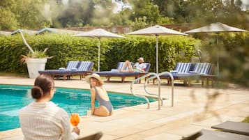Indoor pool, seasonal outdoor pool, pool umbrellas, pool loungers