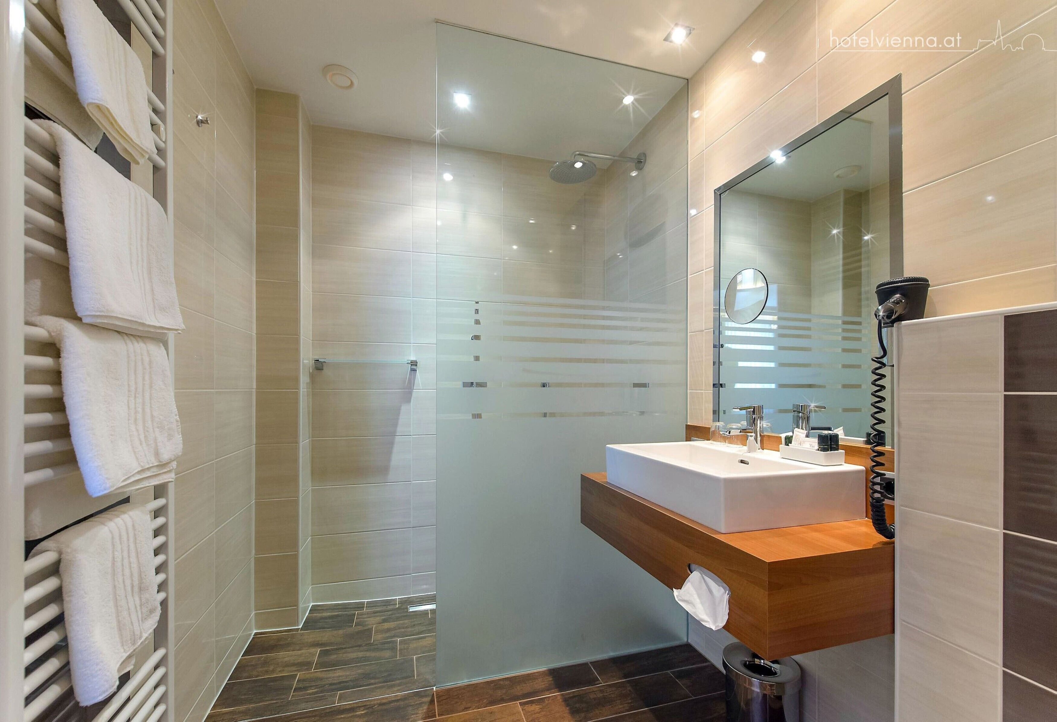 deluxe double room | bathroom | free toiletries, hair dryer, towels