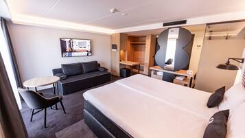 Deluxe suite, 1 queensize bed, niet-roken | Luxe beddengoed, een kluis op de kamer, gratis wifi, beddengoed