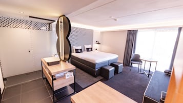 Suite Deluxe, 1 cama de matrimonio, no fumadores | Baño | Ducha y cabezal de ducha tipo lluvia