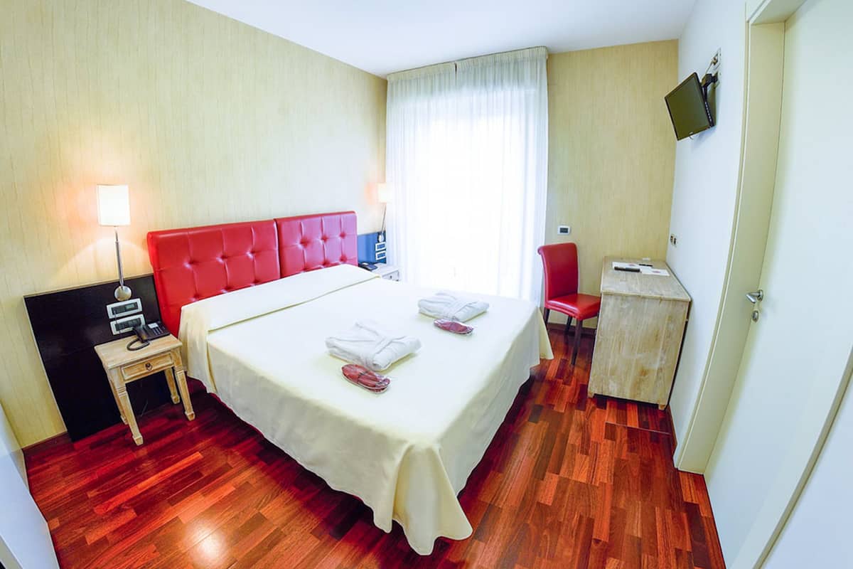 Ropa de cama de alta calidad y minibar