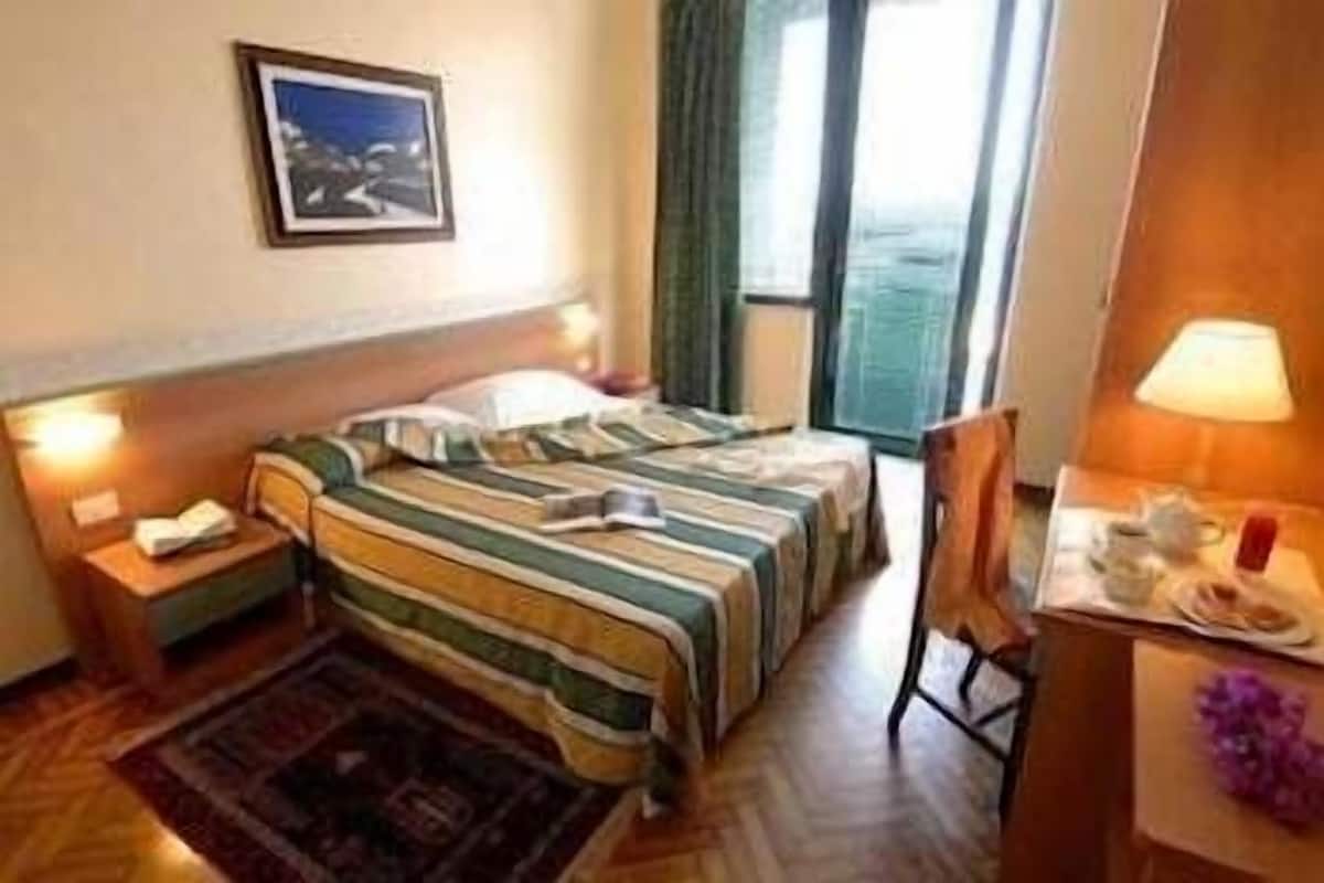 Een kluis op de kamer, extra bedden, gratis wifi, rolstoeltoegankelijk