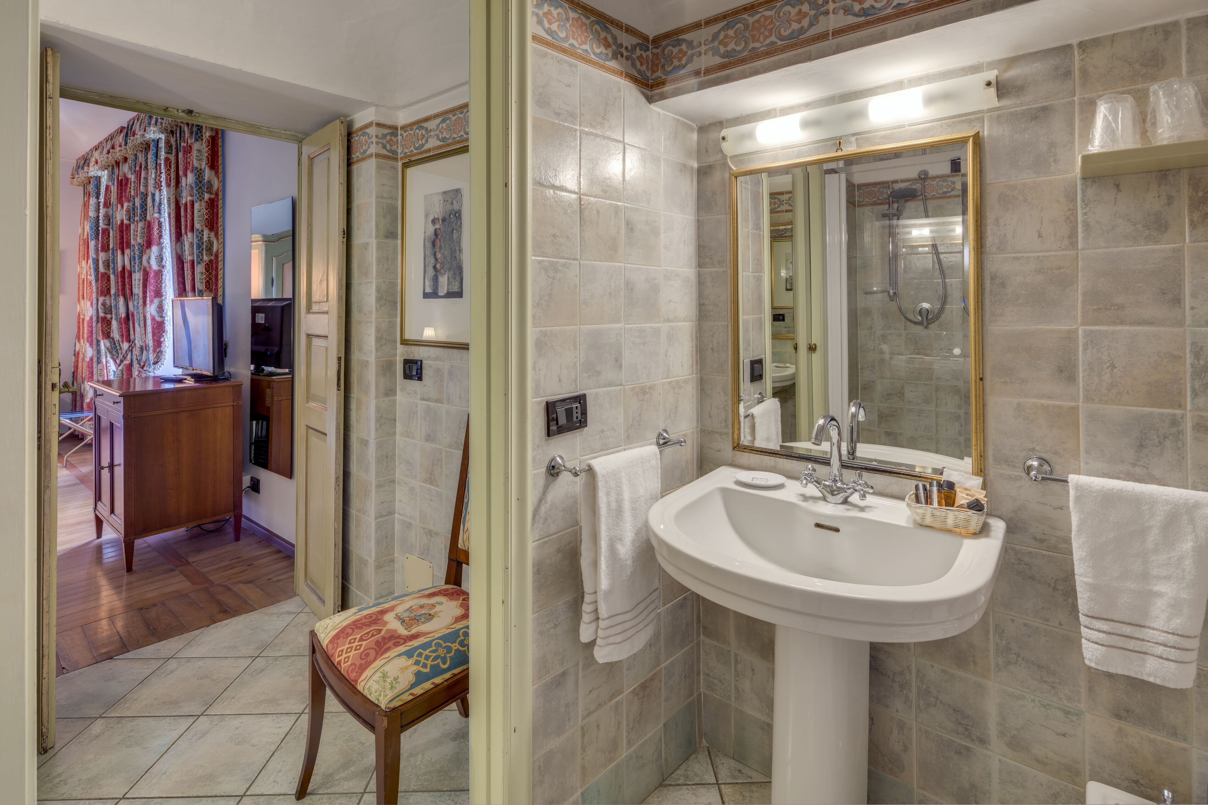 studio suite | bathroom | shower, hair dryer, bidet, towels