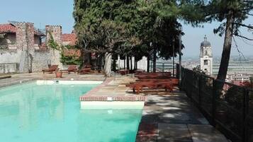 Seasonal outdoor pool, pool umbrellas, pool loungers
