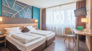 Ropa de cama hipoalergénica y escritorio