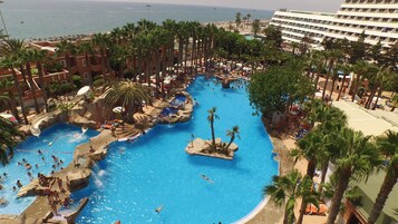 Indoor pool, outdoor pool, pool umbrellas, sun loungers