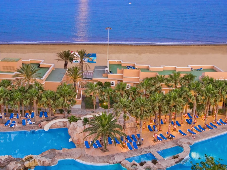 Indoor pool, outdoor pool, pool umbrellas, sun loungers