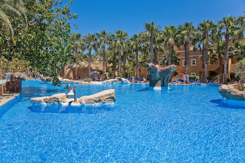 Indoor pool, outdoor pool, pool umbrellas, sun loungers