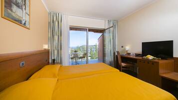 Desk, blackout curtains, free WiFi, bed sheets