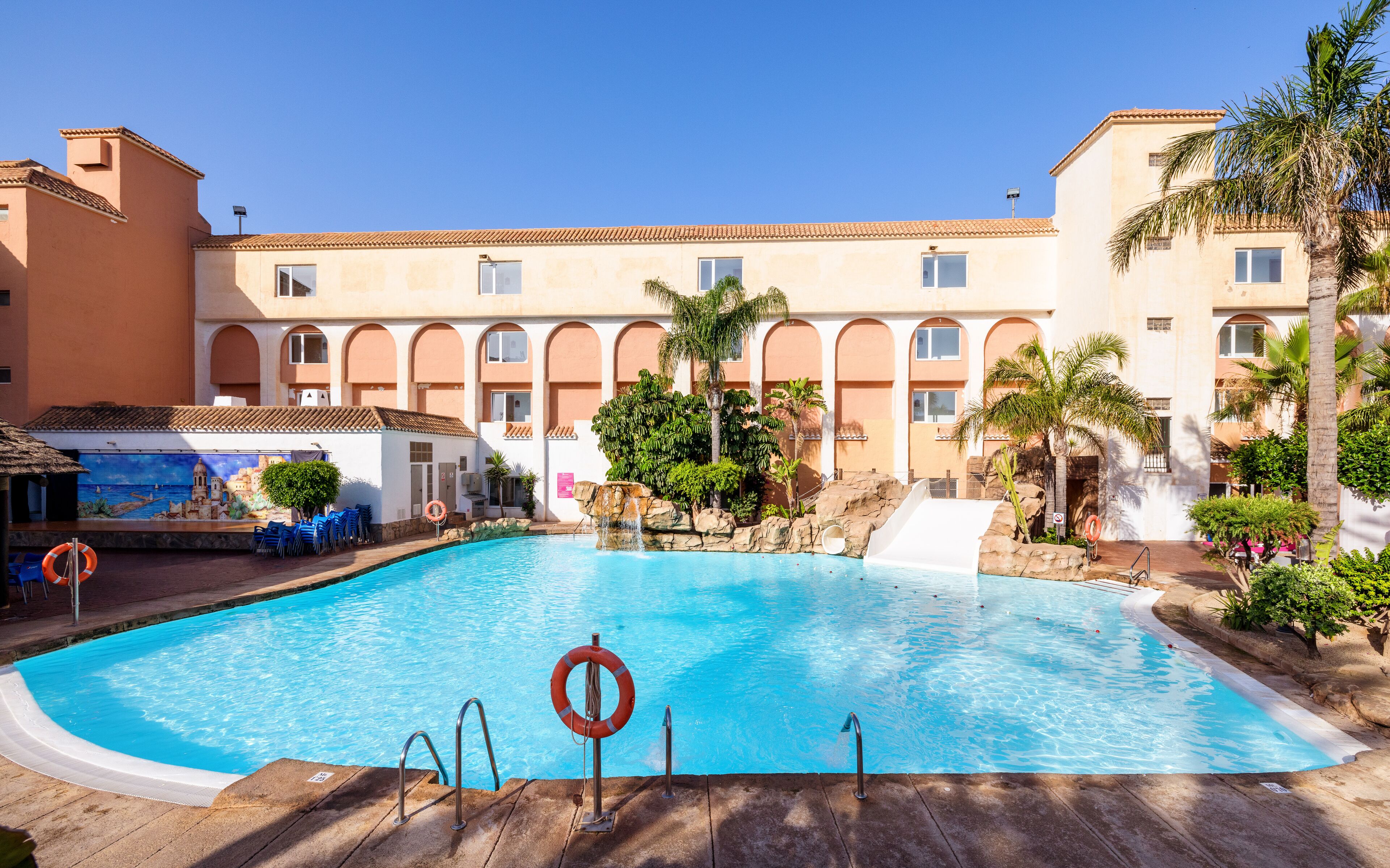 indoor pool, outdoor pool, pool loungers