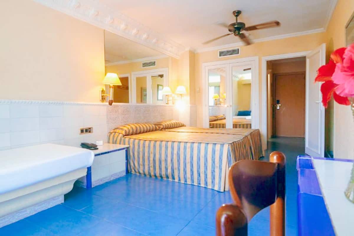 in-room safe, desk, blackout curtains, free wifi