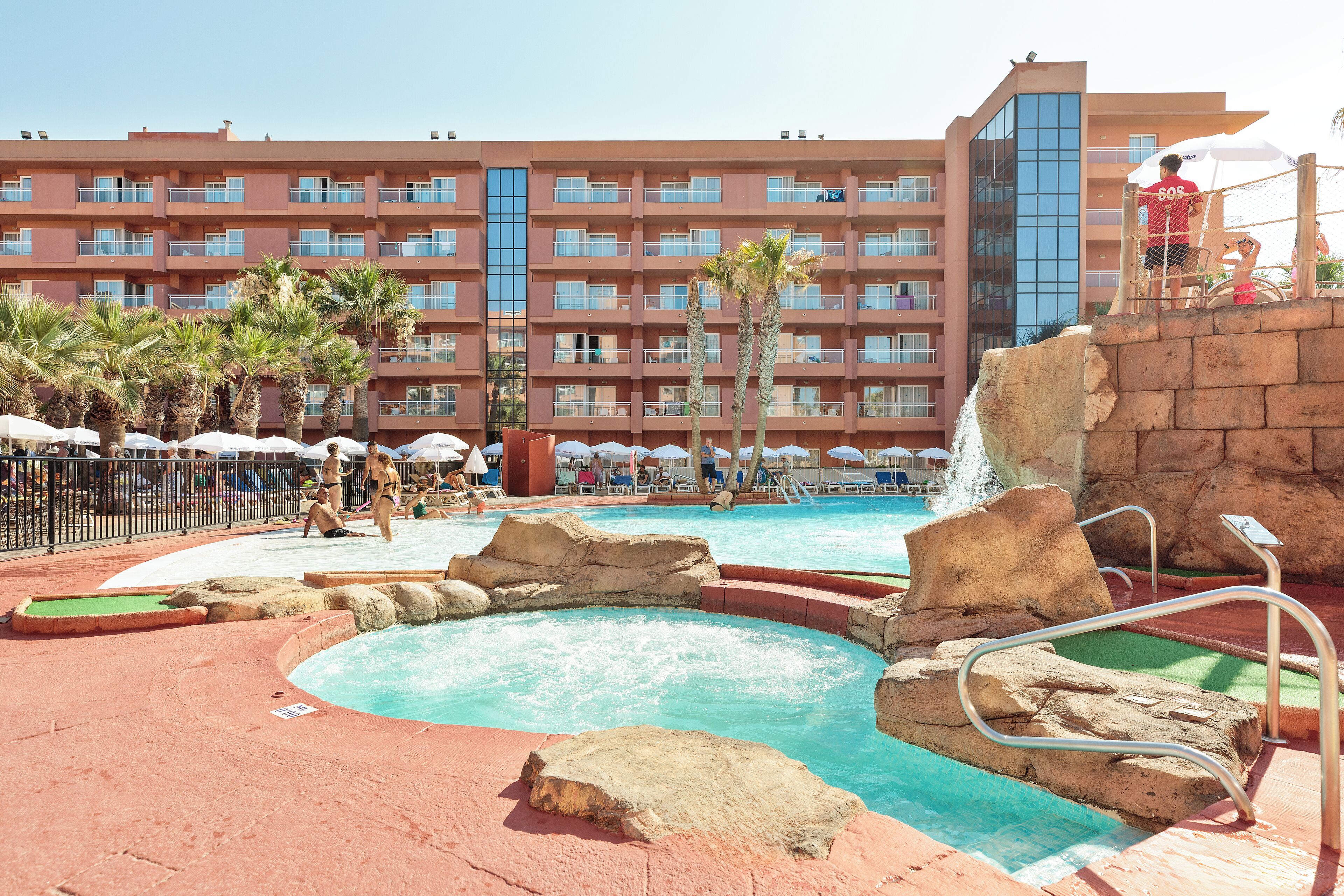 Indoor pool, outdoor pool, pool umbrellas, sun loungers