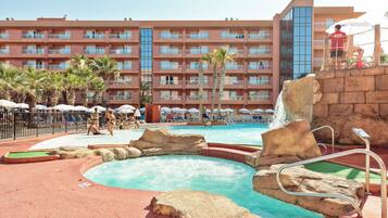 Indoor pool, outdoor pool, pool umbrellas, sun loungers