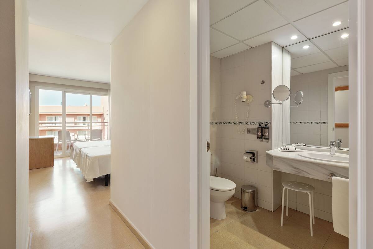 free toiletries, hair dryer, bidet, towels