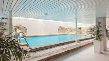Indoor pool, outdoor pool, pool umbrellas, pool loungers