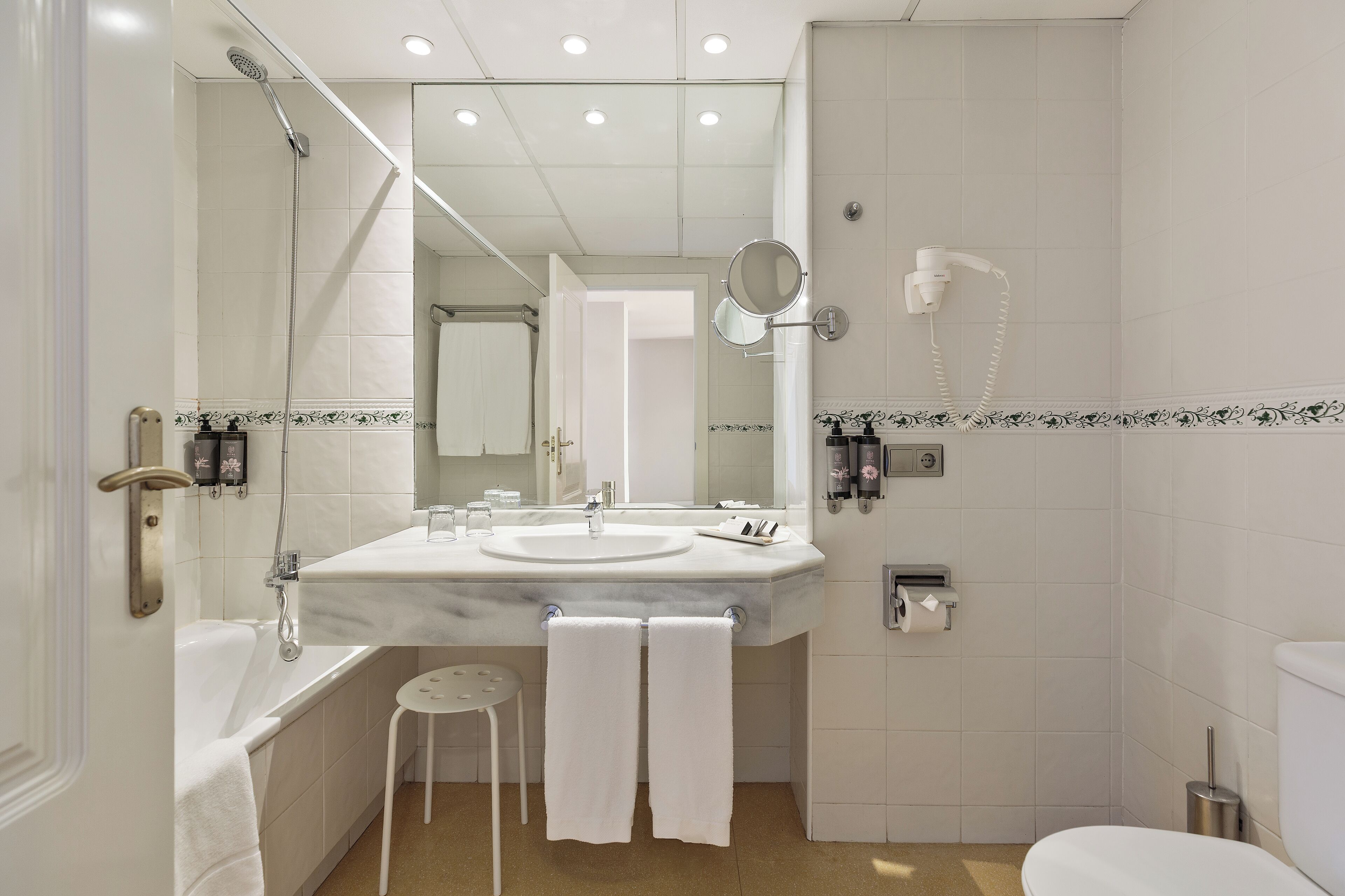 free toiletries, hair dryer, bidet, towels