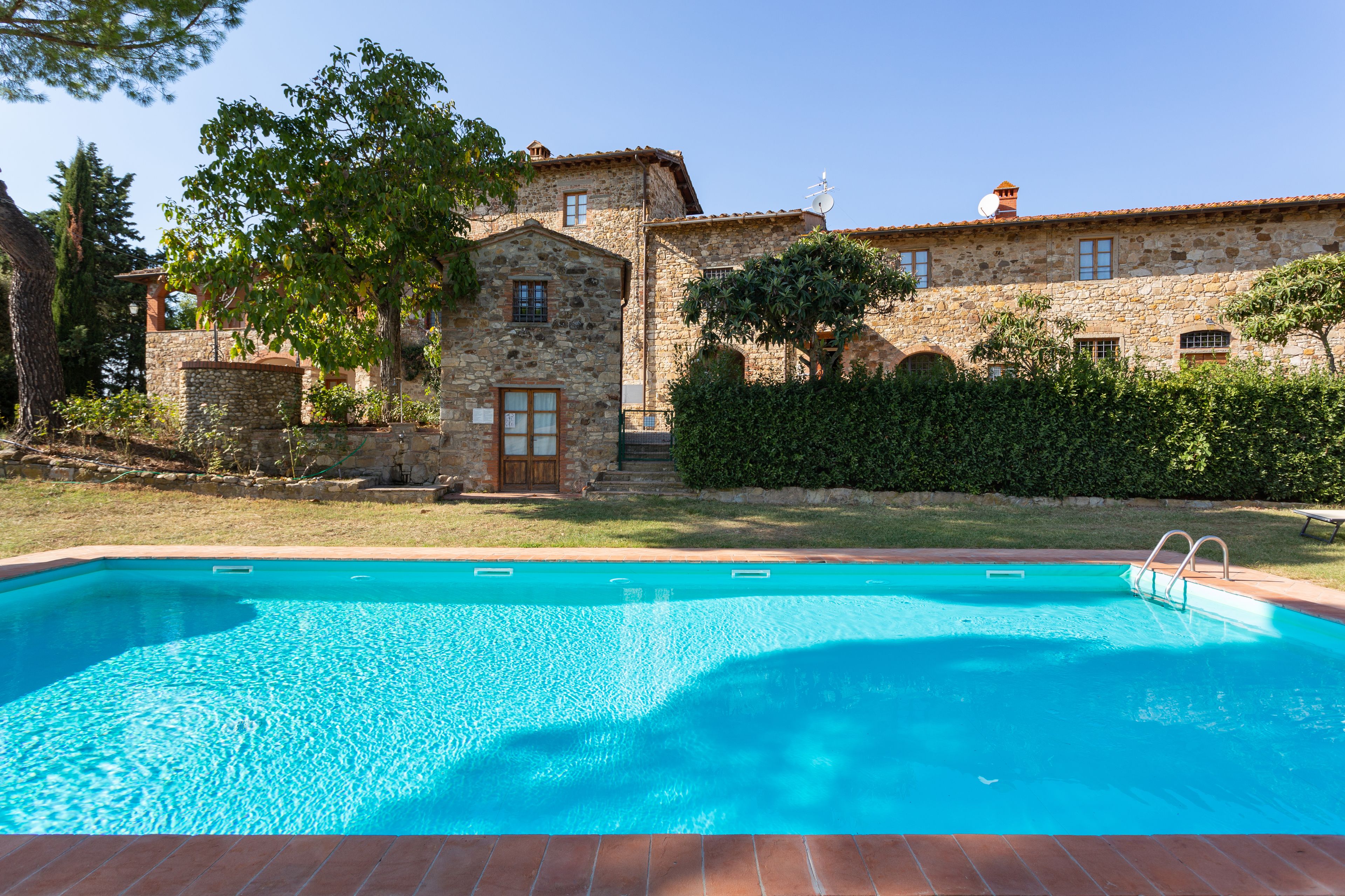 outdoor pool, pool umbrellas, pool loungers