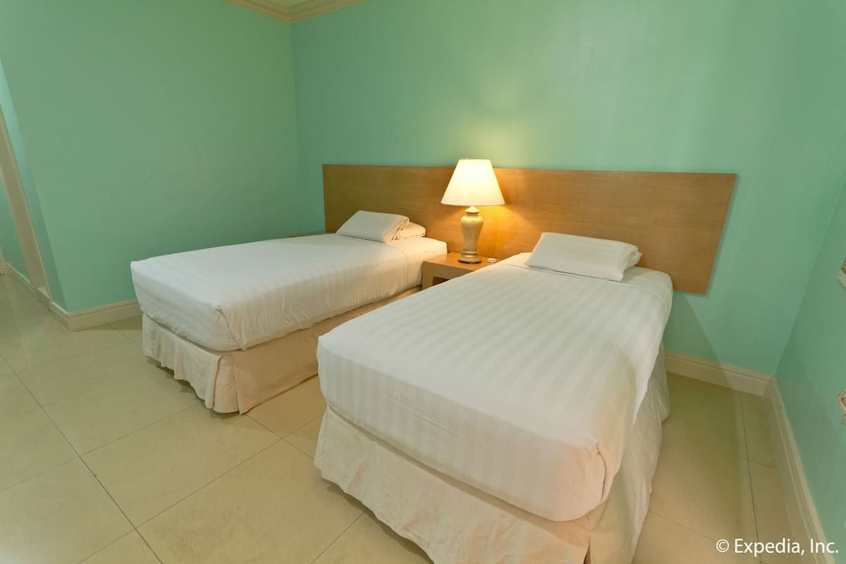 Quarto standard | Escrivaninha, Wi-Fi de cortesia, roupa de cama