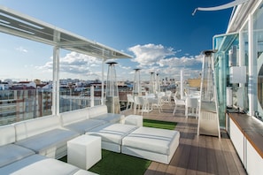 Relax on the rooftop deck with panoramic views of the city.