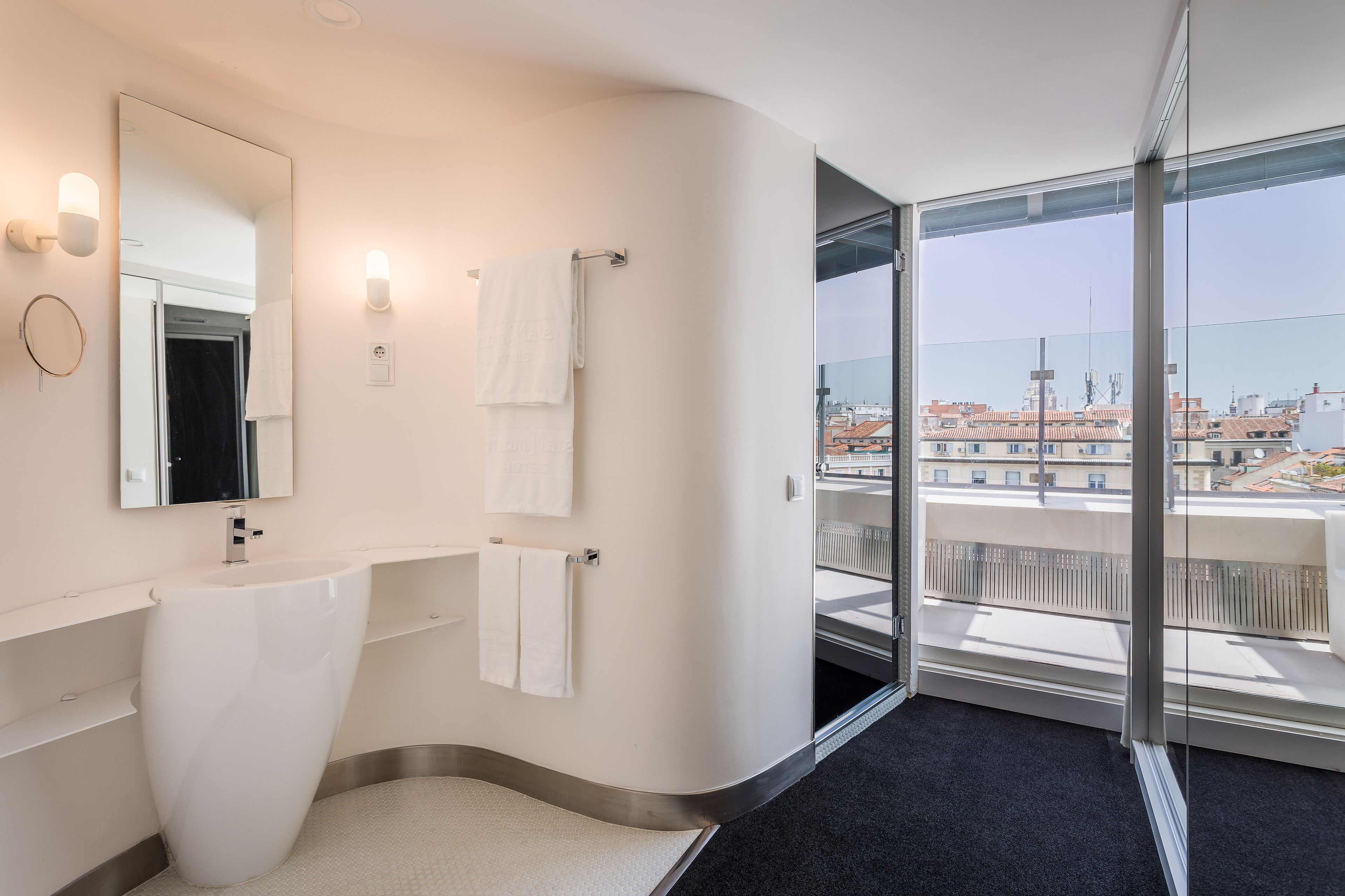 eco-friendly toiletries, hair dryer, towels