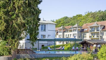 Indoor pool, outdoor pool, open 7:00 AM to 10:00 PM, pool umbrellas
