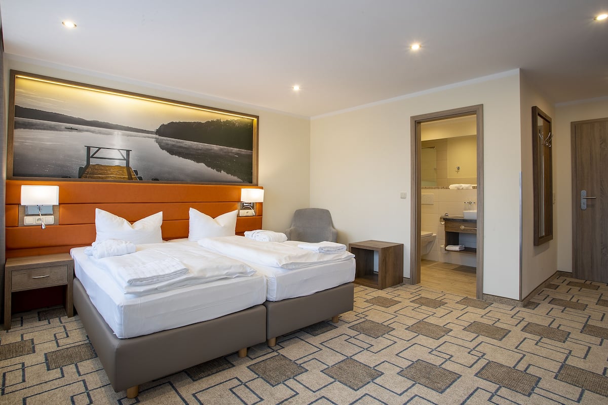 comfort room (in the villa building) | 1 bedroom, minibar, in-room safe, individually furnished