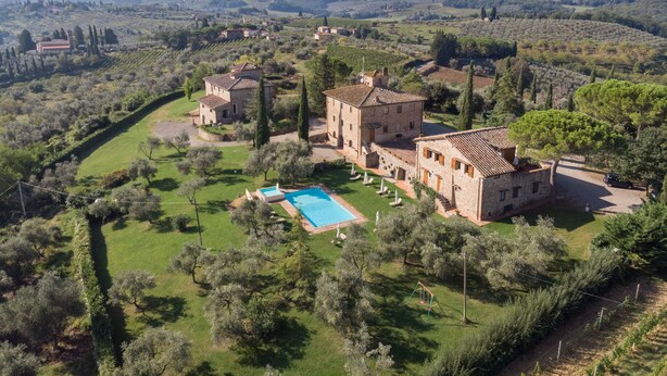 A large estate with multiple buildings, a swimming pool, and surrounding greenery. - Fattoria Querceto (Barberino Tavarnelle)