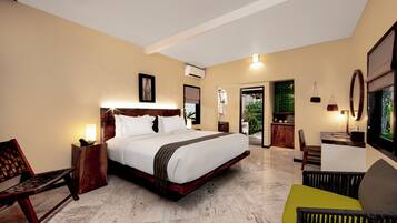 Room, Garden View | Minibar, in-room safe, blackout drapes, iron/ironing board