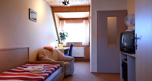 Kamar Single Standar, 1 Tempat Tidur Twin | Minibar, brankas, dan tirai kedap cahaya