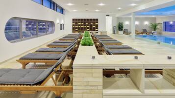 Enjoy a spacious room with a central dining area, large window, and pool access.