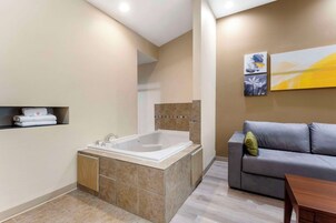 Executive Suite, 1 King Bed, Non Smoking, Hot Tub | Desk, iron/ironing board, free WiFi, bed sheets